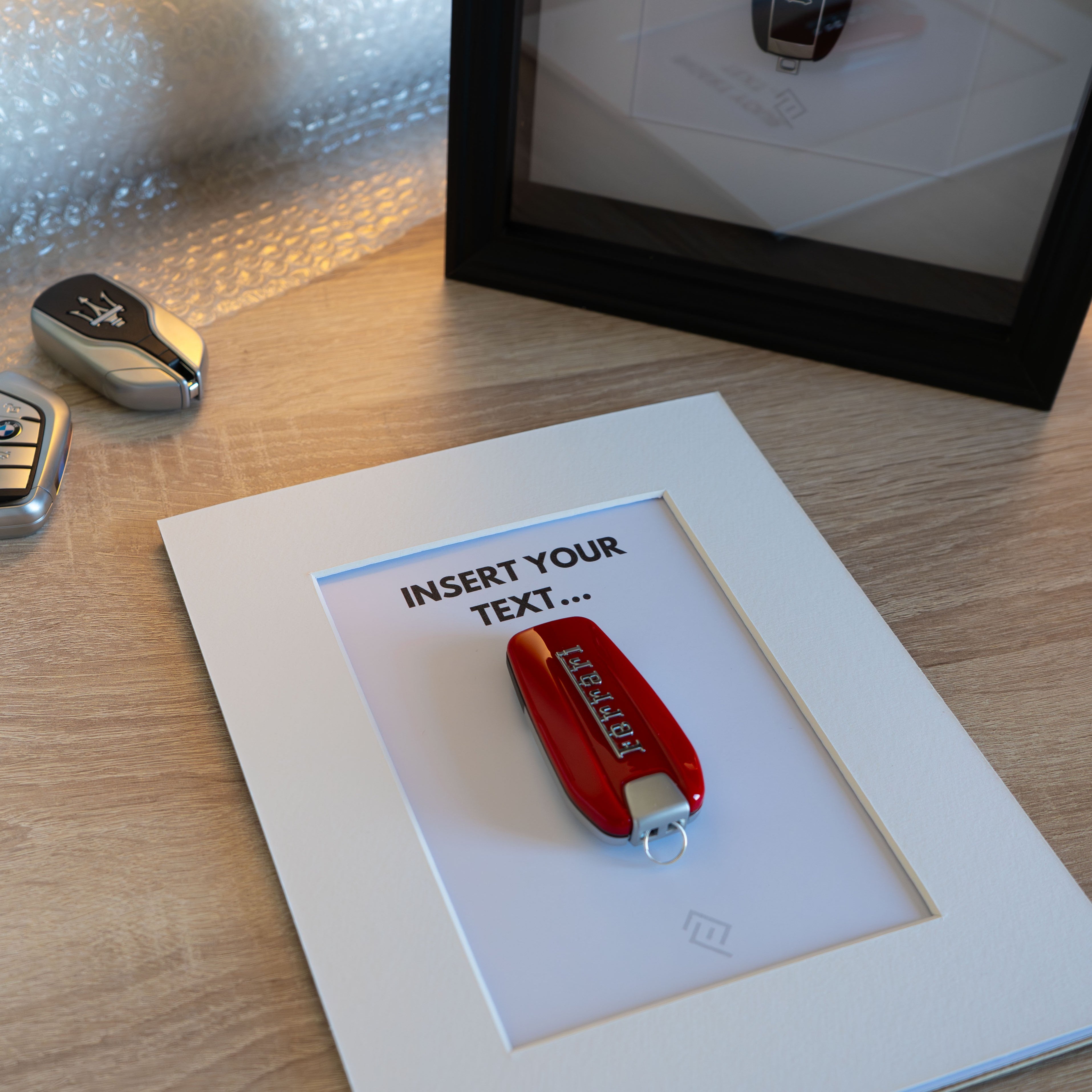 Clé de BMW Encadrée - Phrase de motivation personnalisable