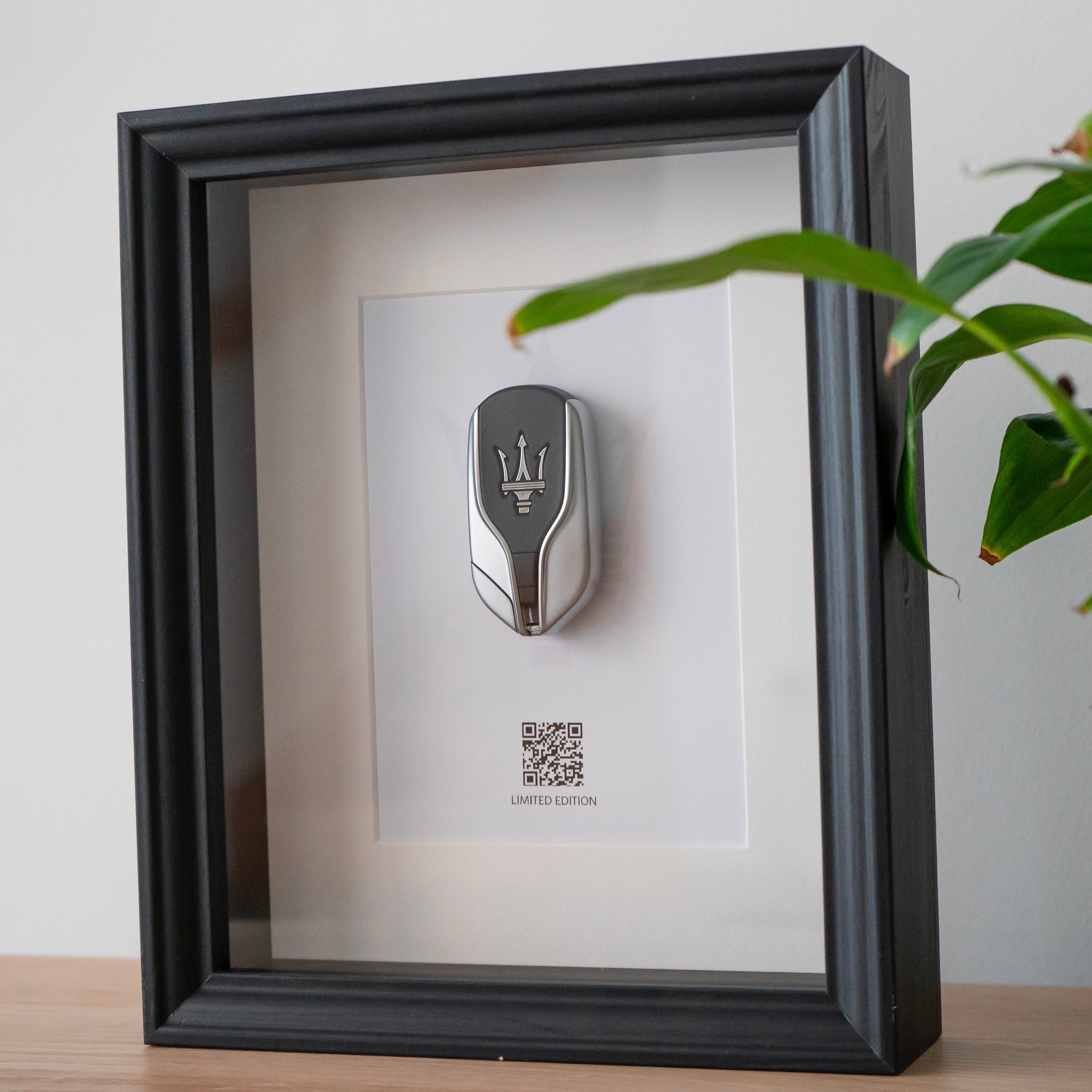 Framed Maserati key decoration